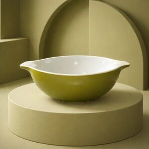 Pyrex Cinderella mixing bowl, likely from the Verde green pattern 443 2 1/2 QT.
